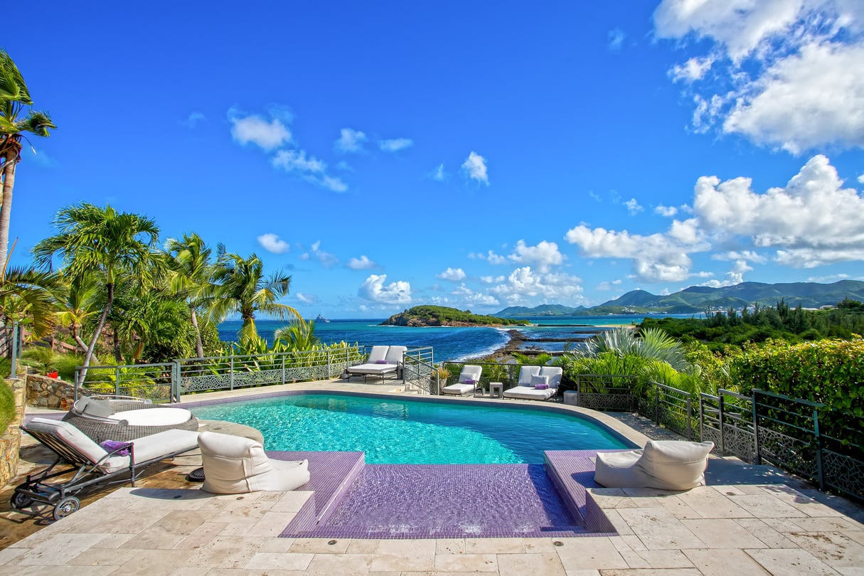 A villa pool overlooking the bay in St. Martin, from sxmsir.com