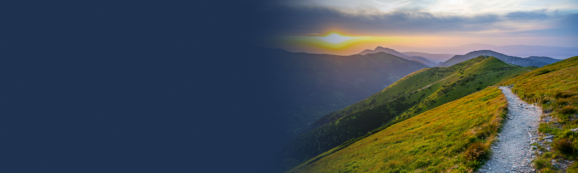 UN Global Compact Communication on Progress banner — a mountain path at sunrise